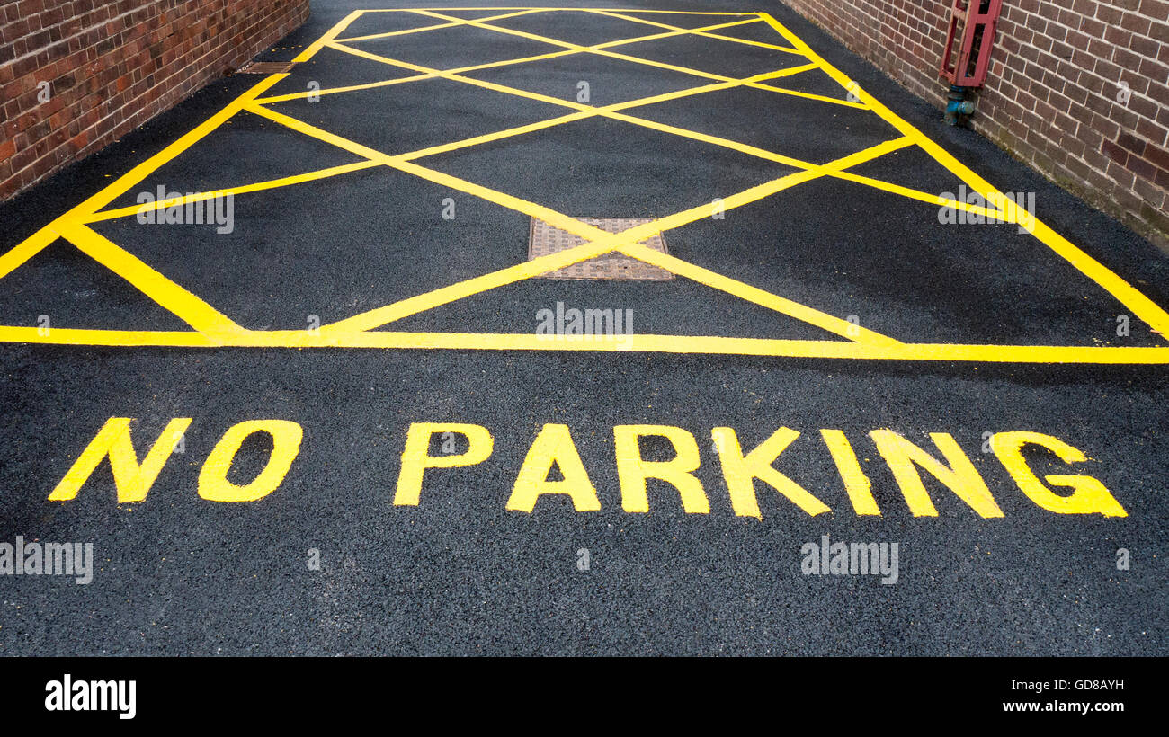 No Parking warning sign on tarmac UK Stock Photo