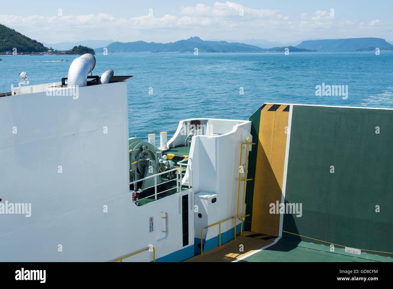 The stern of a roll-on/roll-off ferry as it traverses the Seto Inland Sea. Stock Photo