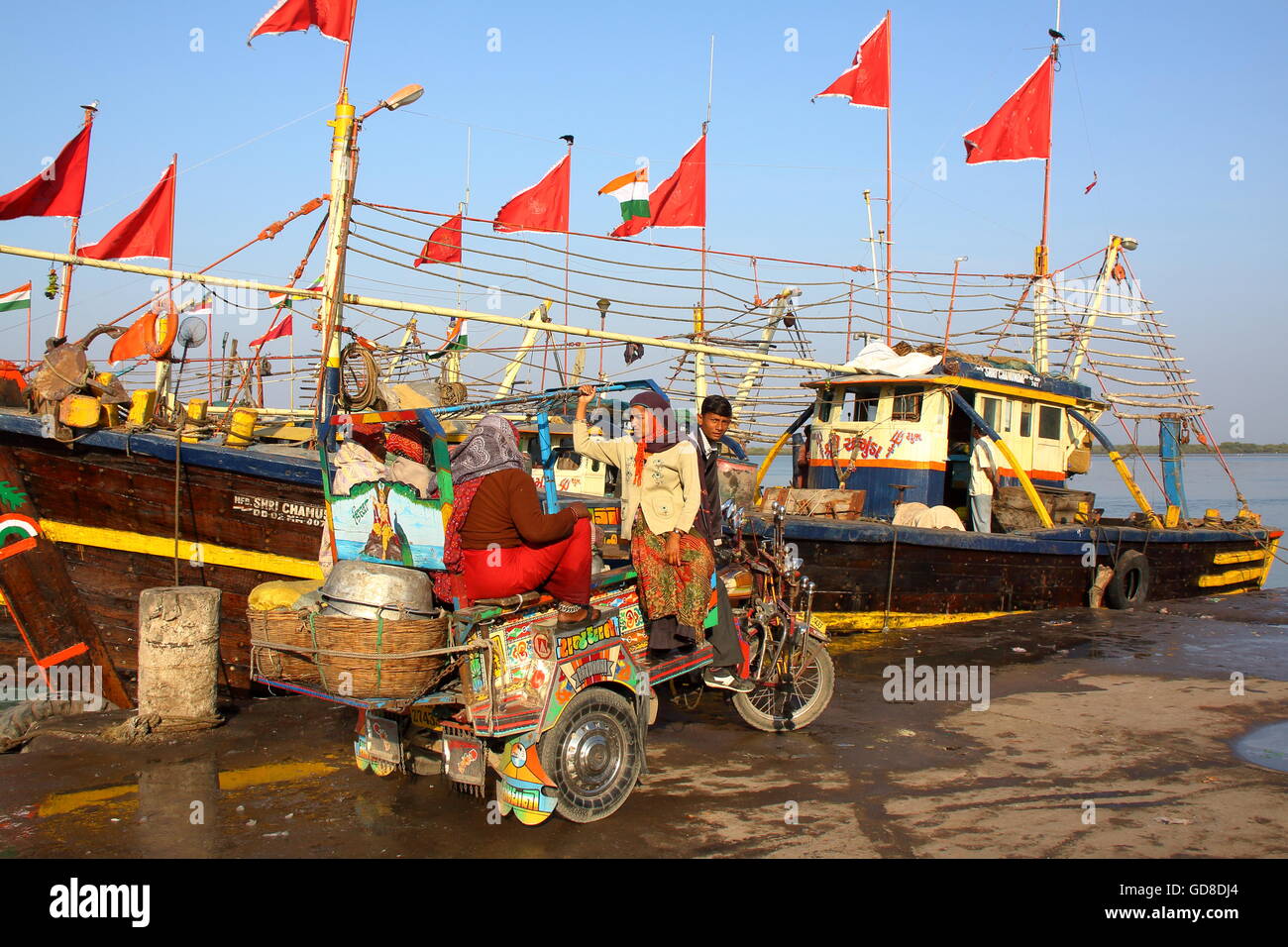 Chakda (Gujarati public transport) at Vanakbara Fishing port in Diu Island, India Stock Photo