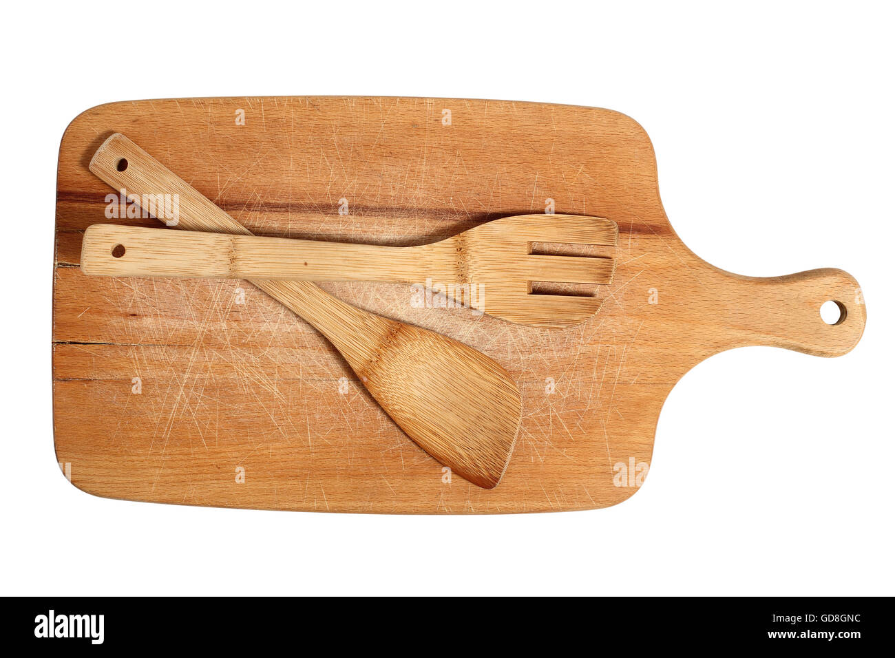 Wooden cutting board with spatula. Isolated with clipping path. Stock Photo