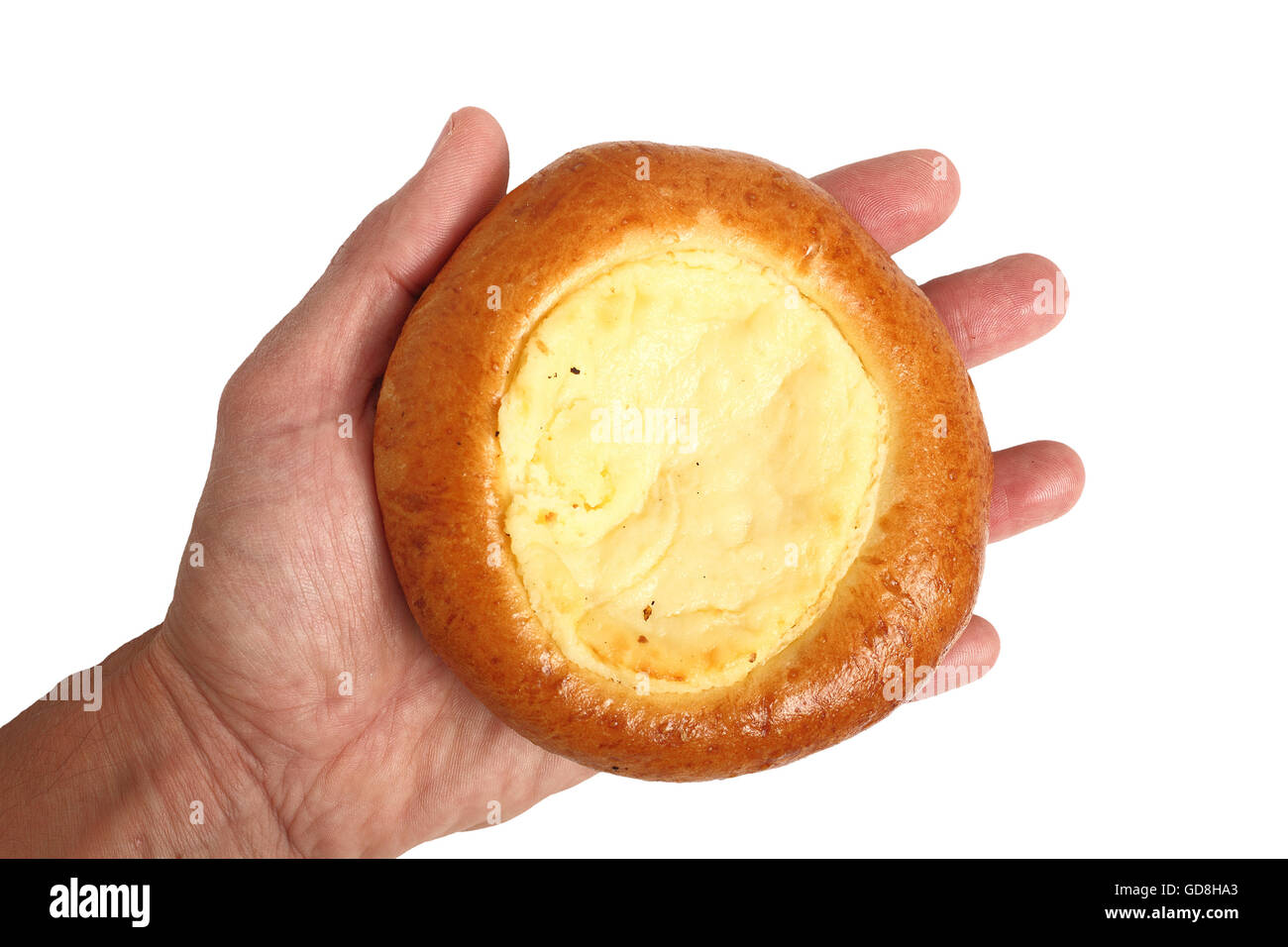 Hand Holding Danish Pastry with Quark Filling. Isolated on white