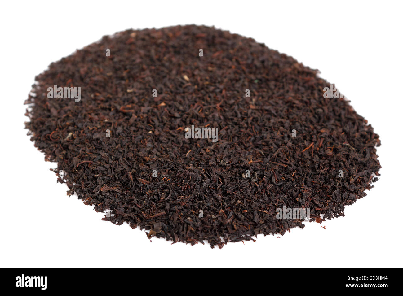 Loose dried black tea leaves. Isolated on white background Stock Photo