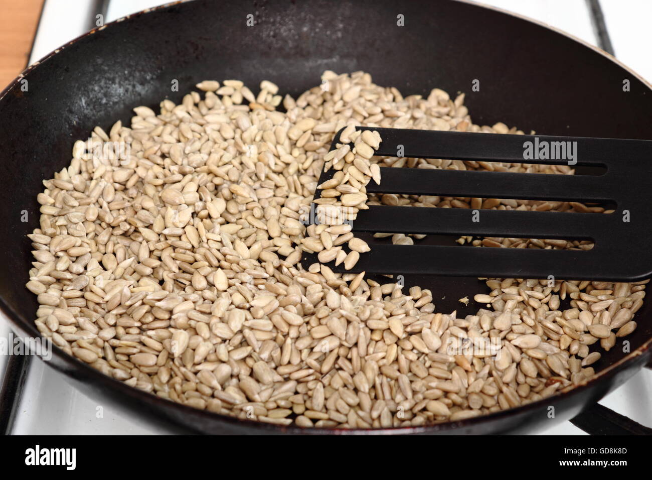 Frying sunflower seeds Stock Photo Alamy