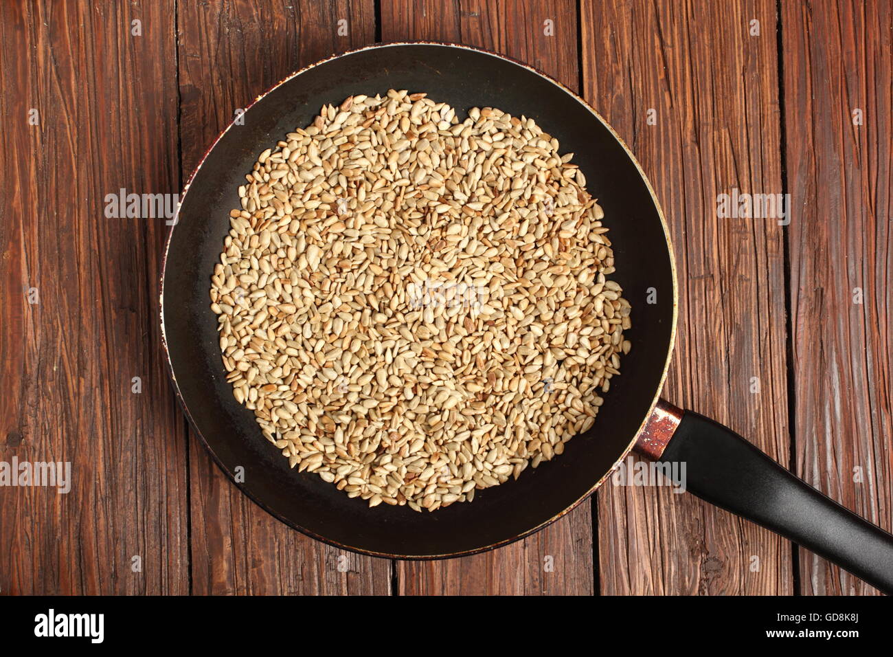 Frying sunflower seeds Stock Photo Alamy