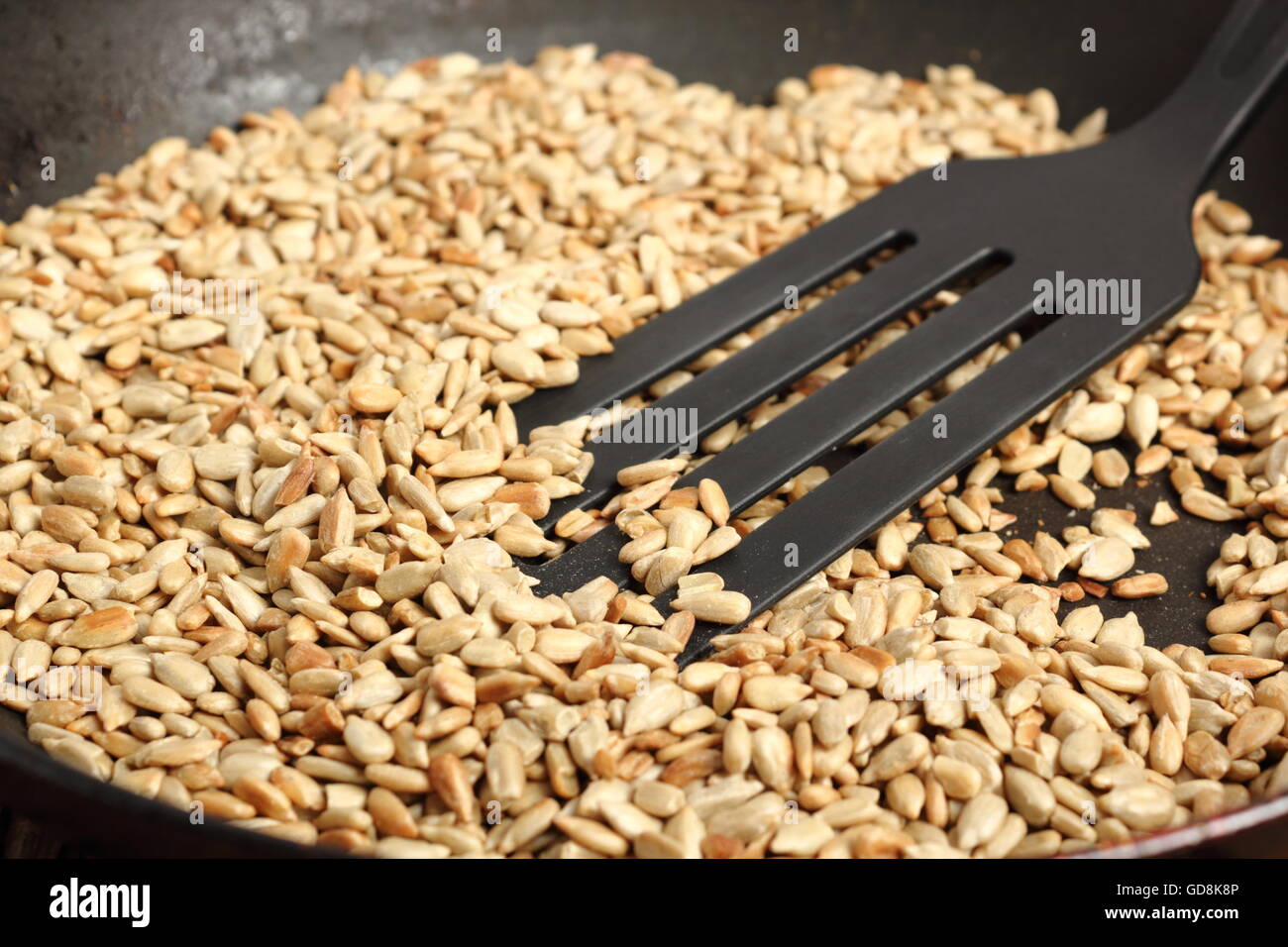 Frying sunflower seeds Stock Photo Alamy