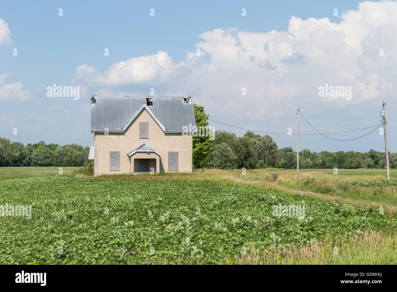 Farm house in a farmers field Stock Photo