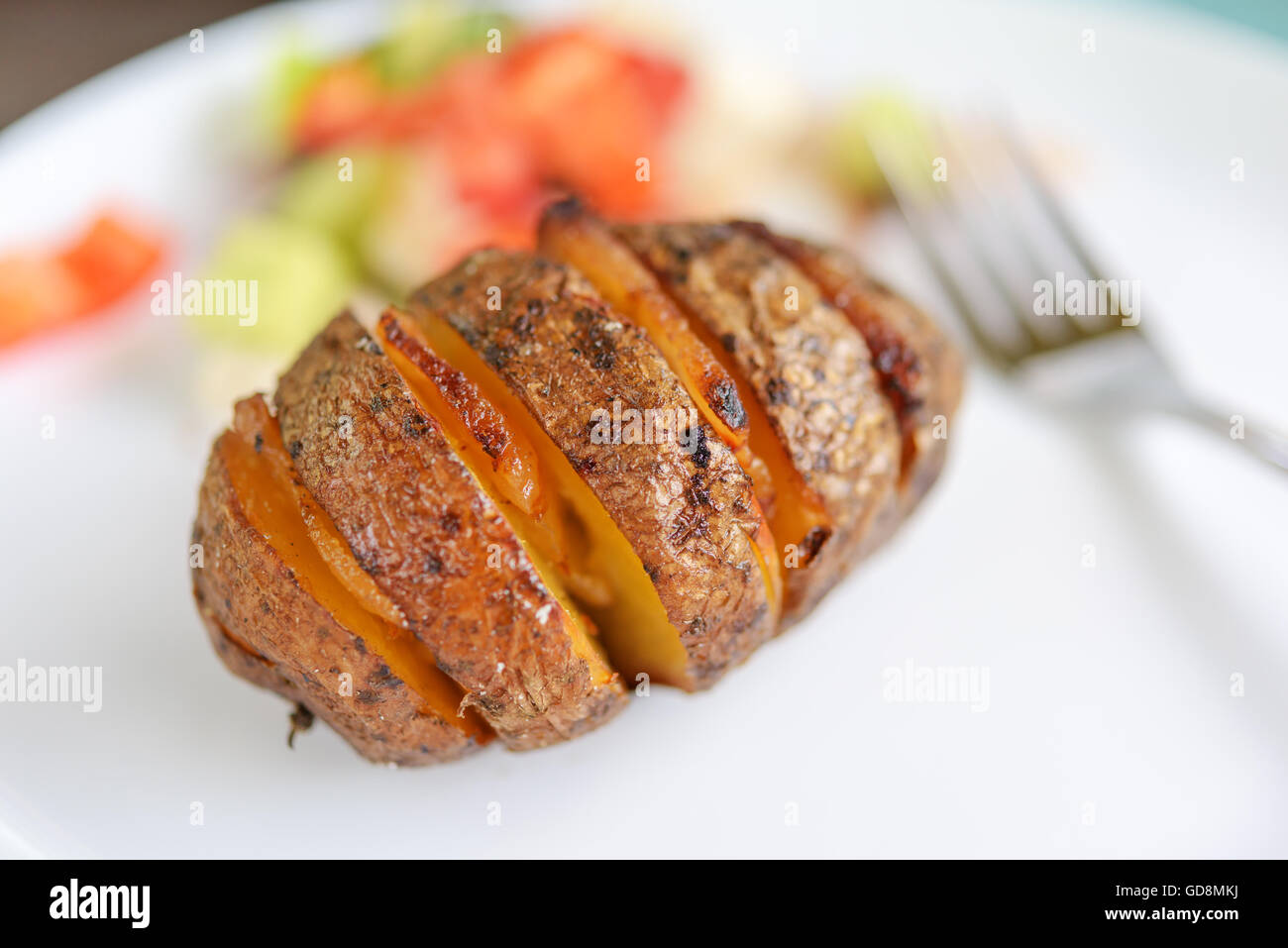 baked potato with bacon closeup Stock Photo