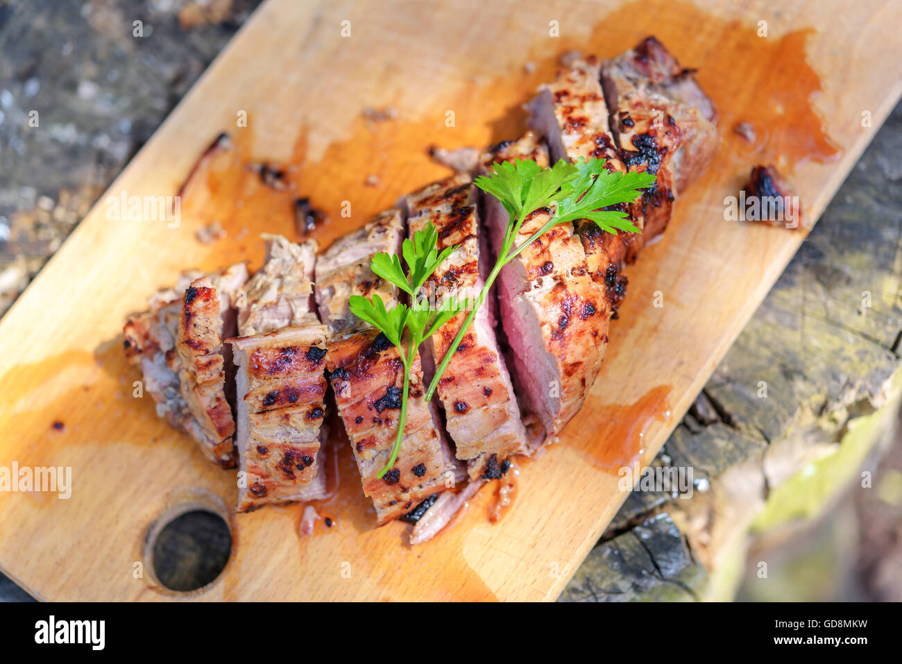 fried pork piece on wood table Stock Photo