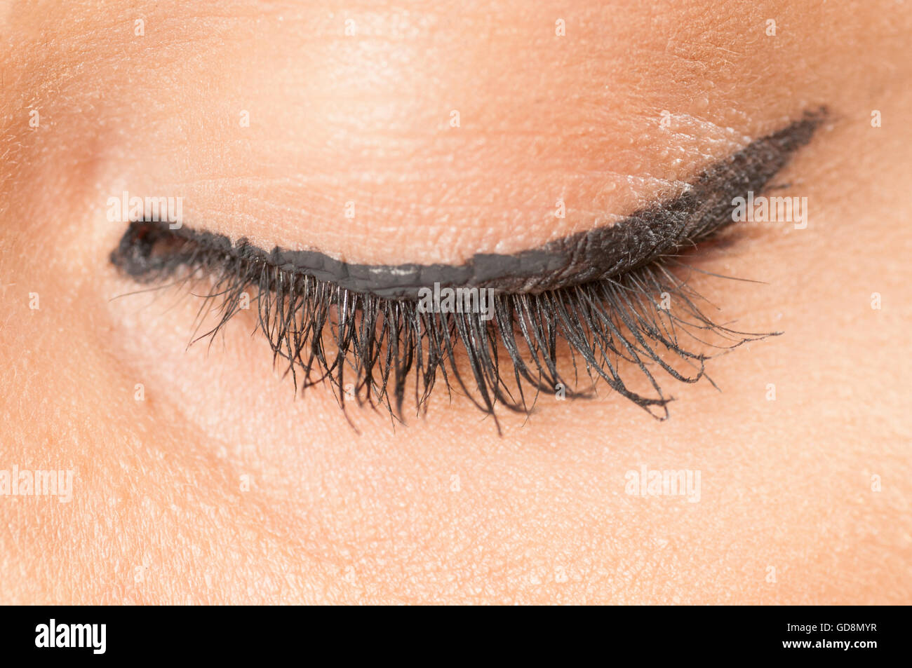 Close up of a woman's eye wearing eyeliner Stock Photo