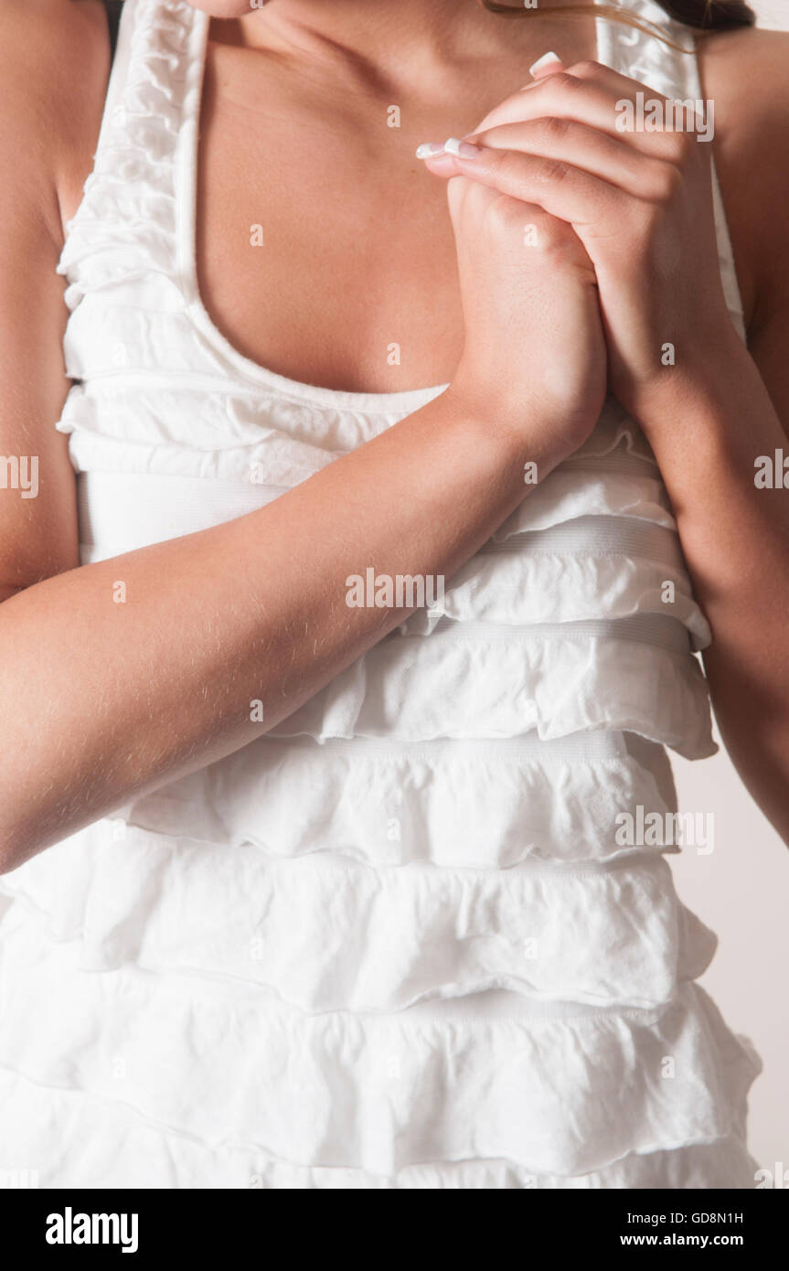 Hands over the chest hi-res stock photography and images - Alamy