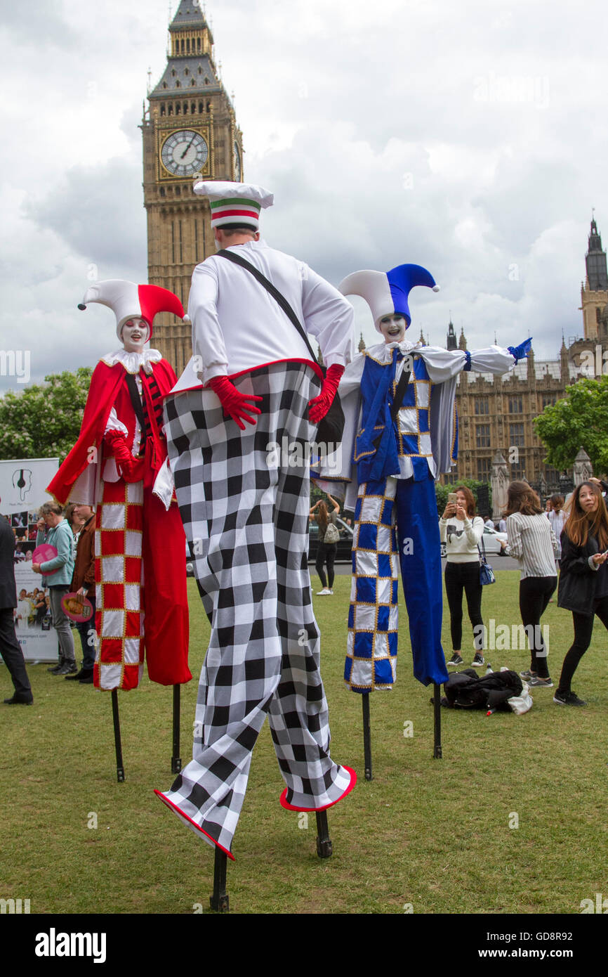 Clowns on stilts hires stock photography and images Alamy