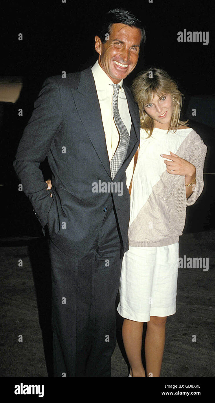 George Hamilton And Catherine Oxenberg. 6th Apr, 2005. 1985 © Roger Karnbad/ZUMA Wire/Alamy Live News Stock Photo