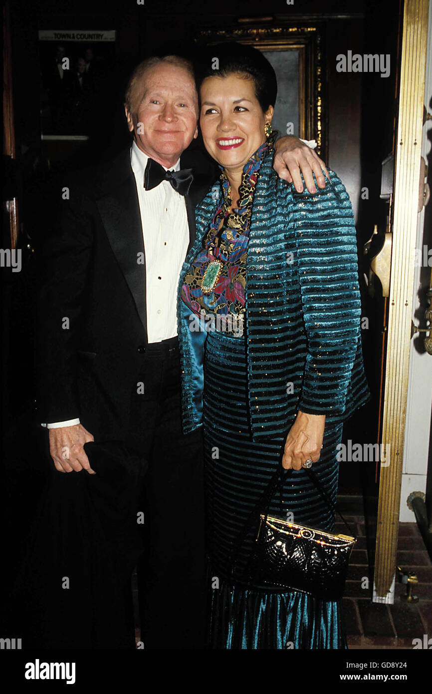 Red Buttons and wife Alicia at a hand and footprint ceremony for Jack  Valenti at Grauman's Chinese Theatre, Los Angeles, CA, Decmeber 6, 2004.  (photo: Michael Germana/Everett Collection Stock Photo - Alamy