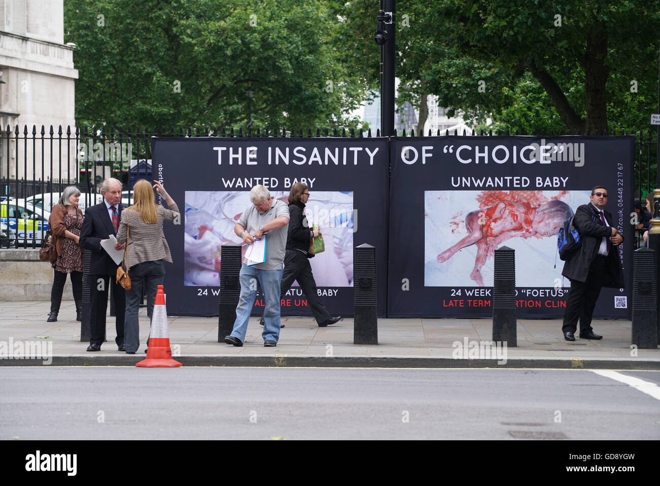 London, UK. 13th July, 2016. abort67 holds a demonatration against abortion, The Insanity of 'Choice' and gives adwareness to people a foetus is a living human baby and has the right to lives outside downing street, London, UK. Credit:  See Li/Alamy Live News Stock Photo
