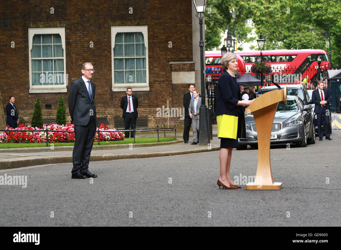 London, UK. 13th July, 2016. Philip May watches with a smile on his face as his wife, Prime Minister Theresa May, makes her arrival speech at Number 10 Downing Street. Theresa May has officially become the new Prime Minister after meeting with HM Queen Elizabeth II at Buckingham Palace. Theresa May becomes the second woman Prime Minister in Great Britain, Margaret Thatcher was the first. David Cameron left Number 10 Downing Street with wife Samantha and their children, a short while earlier.  Credit:  Paul Marriott/Alamy Live News Stock Photo