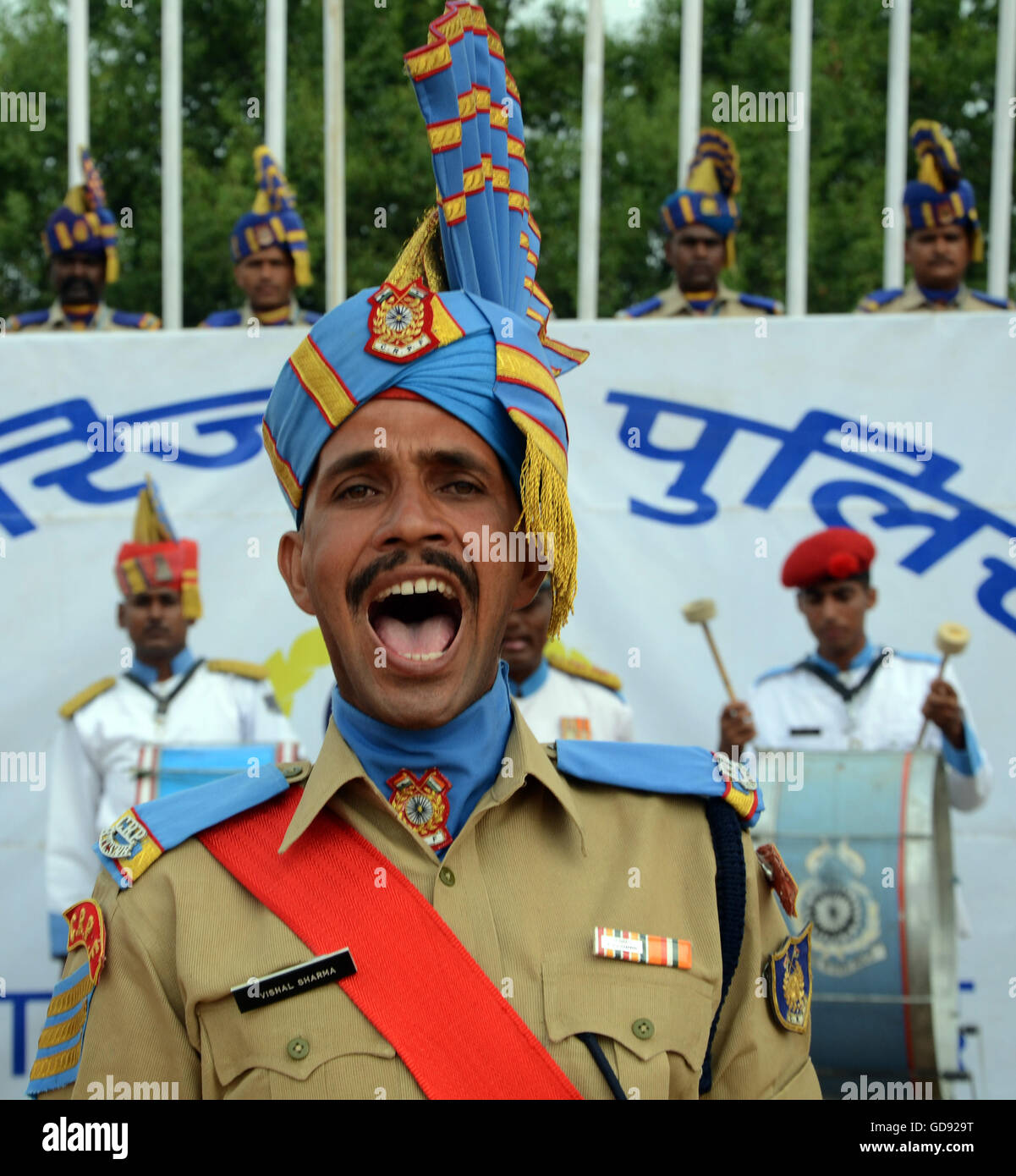 Srinagar, Indian Administered Kashmir. 14th July, 2016.  An Indian Central Reserve Police Force (C R P F) Constables shouts command during their passing out parade in Humhama, on the outskirts of Srinagar,India.512 newly trained CRPF recruits took an oath to serve India by working in the police force during their passing out parade. The recruits have successfully completed their 44 weeks of training which involved, weapons handling, map reading and counter-insurgency operations. These recruits will join Indian paramilitary to fight militants in Kashmir. Credit:  Sofi Suhail/Alamy Live News Stock Photo