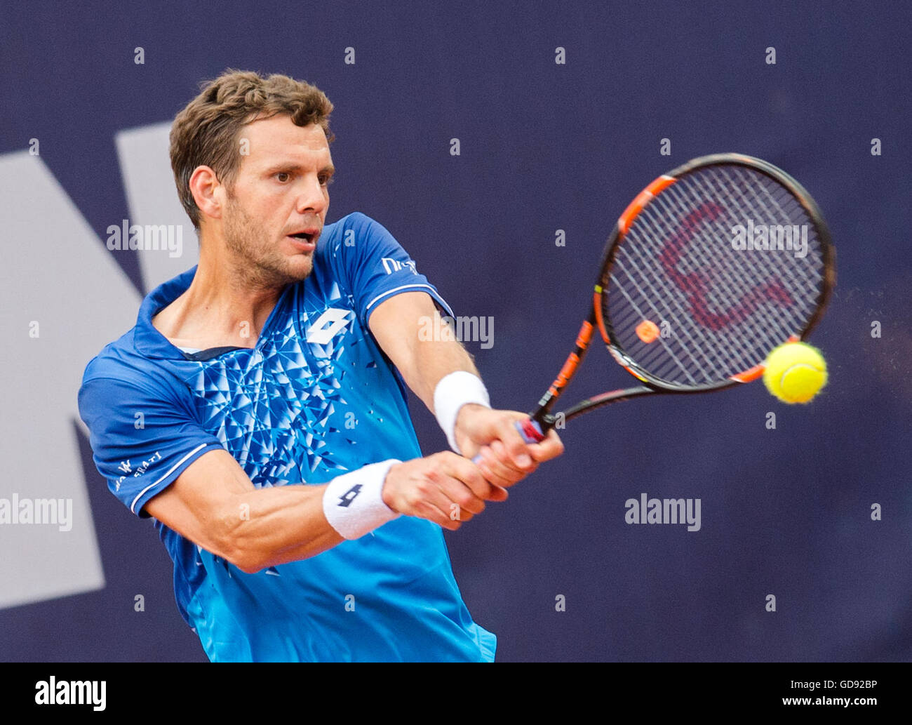 Hamburg, Germany. 13th July, 2016. Paul-Henri Mathieu from France plays against Nicolas Almagro from Spain in the second round of the German Tennis Championships at the tennis stadium Am Rothenbaum in Hamburg, Germany, 13 July 2016. Photo: Daniel Bockwoldt/dpa/Alamy Live News Stock Photo