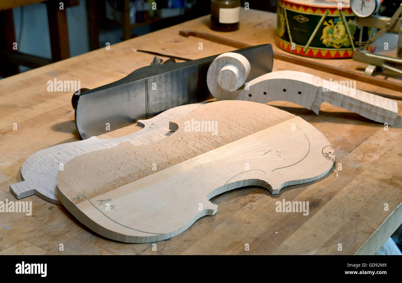 The back of a viola lies on a workbench in the workshop of instrument maker Ian Crawford McWilliams in Brandenburg on the Havel, Germany, 2 June 2016. The Canadian McWilliams builds handmade fiddles, violas, cellos and chelys that are sold worldwide. Photo: Bernd Settnik/ZB Stock Photo