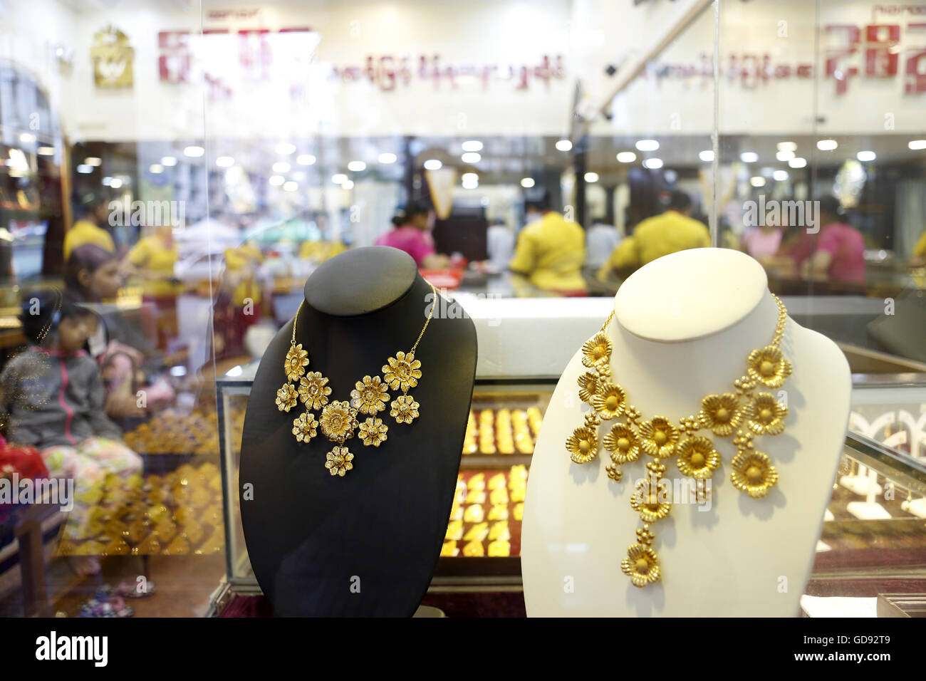 Yangon, Myanmar. 14th July, 2016. Gold necklaces are displayed at a 