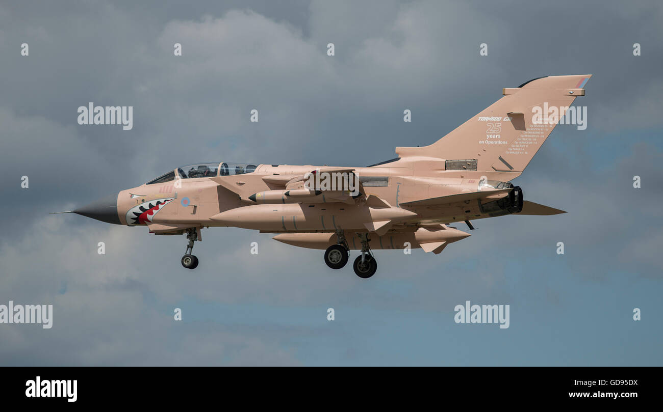 Farnborough, Hampshire UK. 14th July 2016. Day 4 of the Farnborough International Trade Airshow. Visiting RAF Tornado GR4 painted in Gulf War Desert Pink with a livery celebrating 25 years of combat operations touches down. Credit:  aviationimages/Alamy Live News. Stock Photo