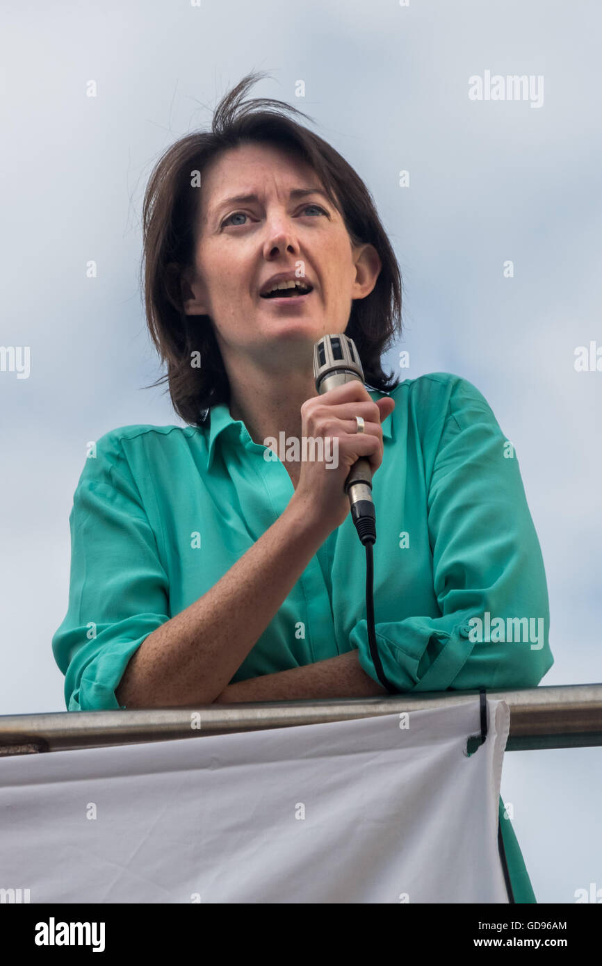 London, UK, 14th July 2016. Junior doctor Aislinn Macklin-Doherty speaking to healthcare workers and supporters dedicated to saving a publicly funded, delivered and accountable NHS wh have met outside St Bartholomew's Hospital for the march and rally organised by NHS Solidarity. Peter Marshall/Alamy Live News Stock Photo