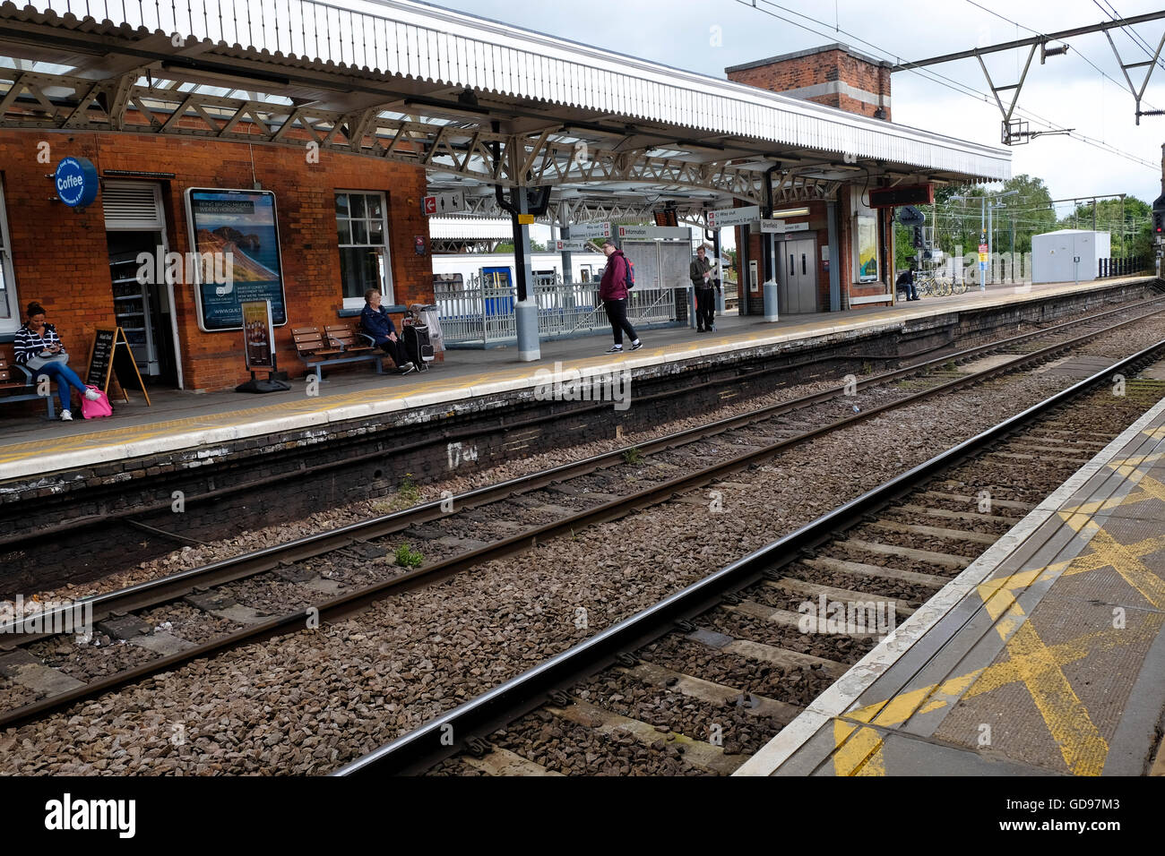 Commuters wait for their train at an Essex train station UK Stock Photo - Alamy