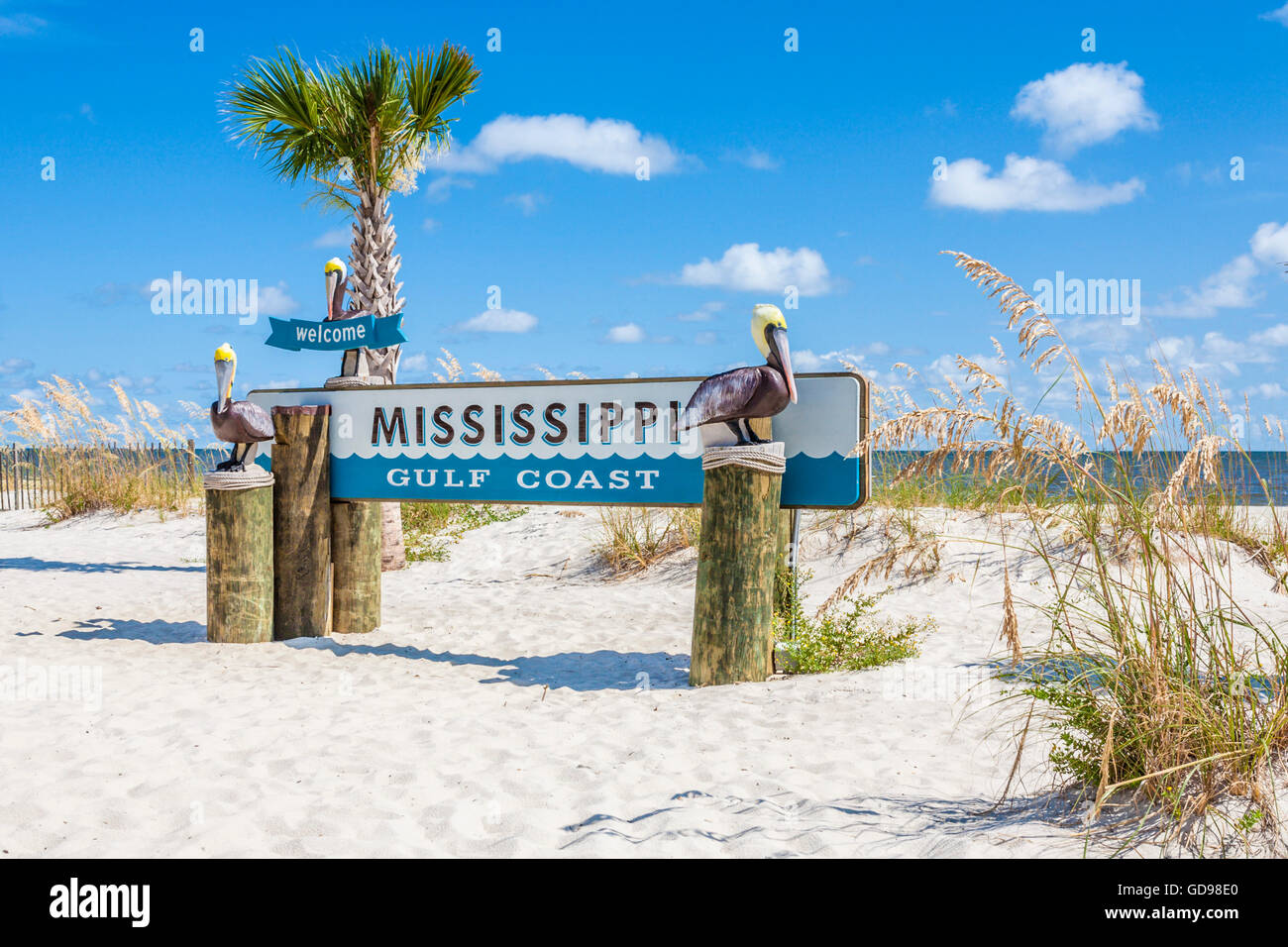 Sign at the beach welcomes visitors to the Mississippi Gulf Coast at Gulfport, Mississippi Stock Photo
