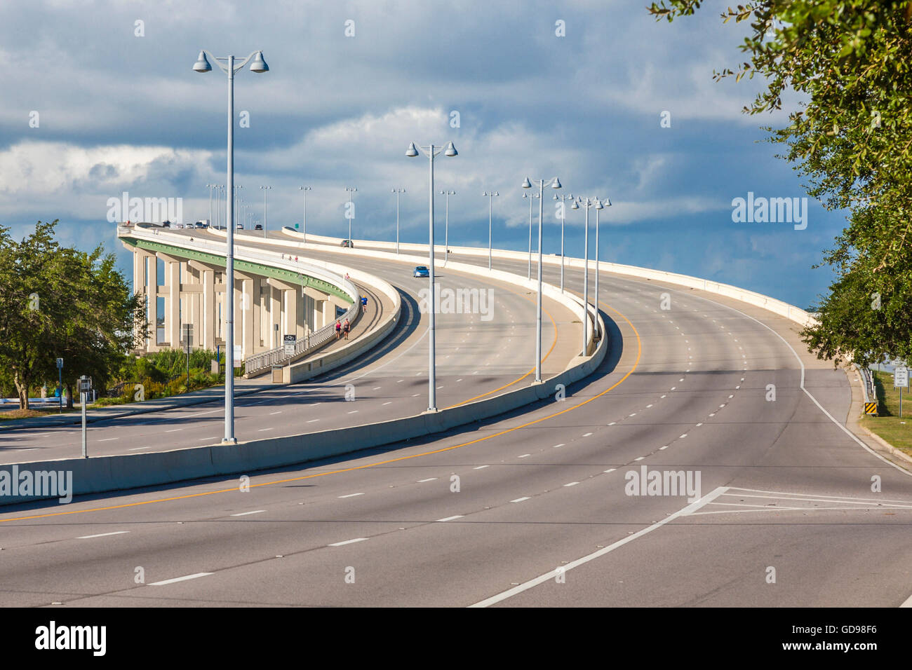 Tall, curved Highway 90 bridge from Biloxi to Ocean Springs, Mississippi over the entrance to the Back Bay Stock Photo