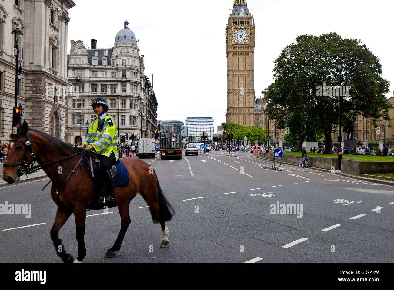 Mounted British police on patrol near Parliament Square London with Big Ben a London landmark in the background Stock Photo