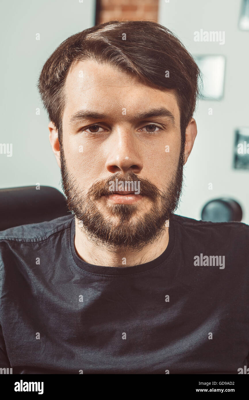 The young man looking at camera Stock Photo - Alamy