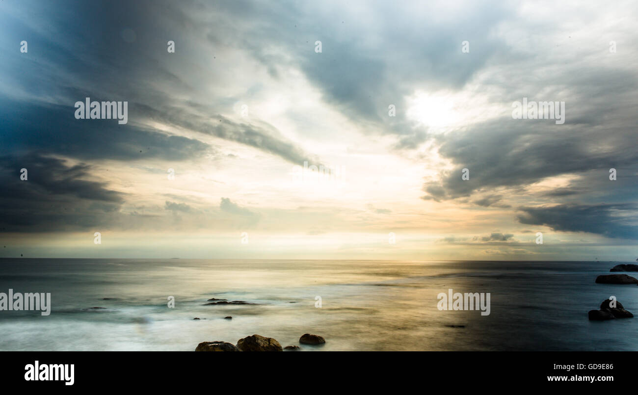 Cloudy sunset over the sea in over Galle, Sri Lanka. Stock Photo