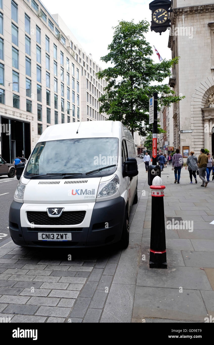 A UK Mail Delivery Vehicle Parked In The Street In The City Of London 