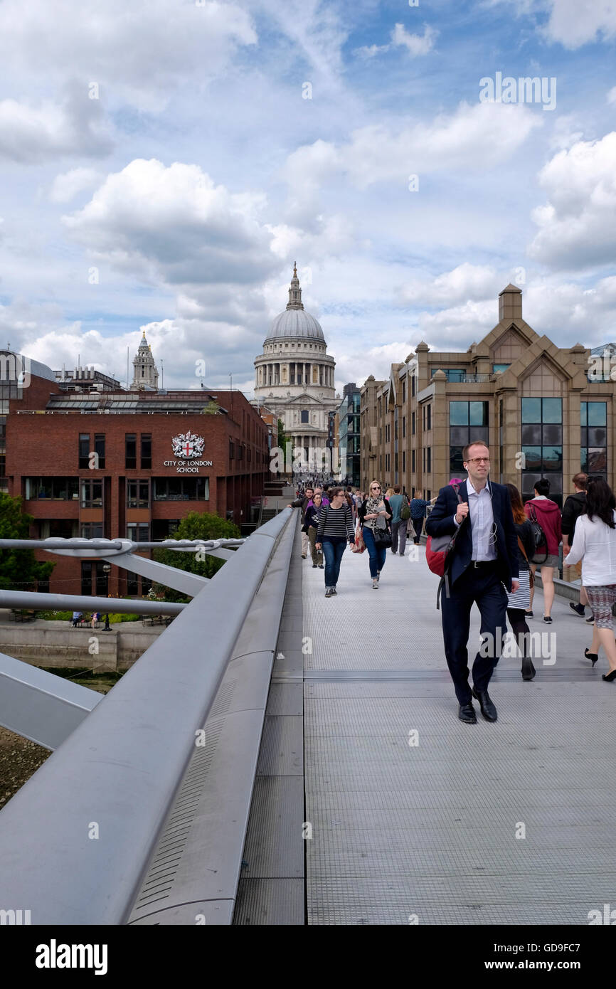 London, United Kingdom. London Skyline from the Millennium Bridge which crosses the Thames river with St Paul's Cathedral on the skyline Stock Photo