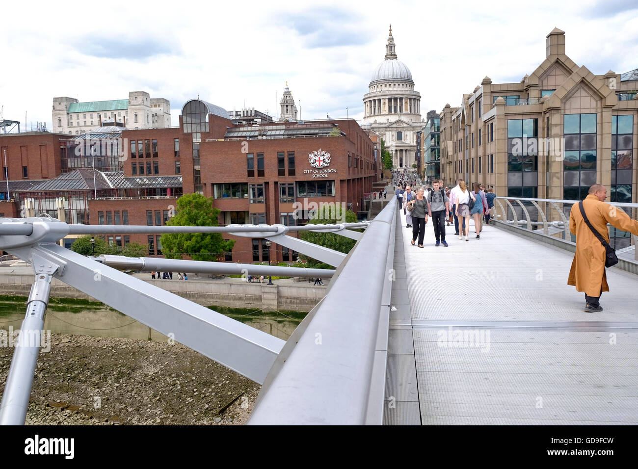 London, United Kingdom. London Skyline from the Millennium Bridge which crosses the Thames river with St Paul's Cathedral a London landmark Stock Photo