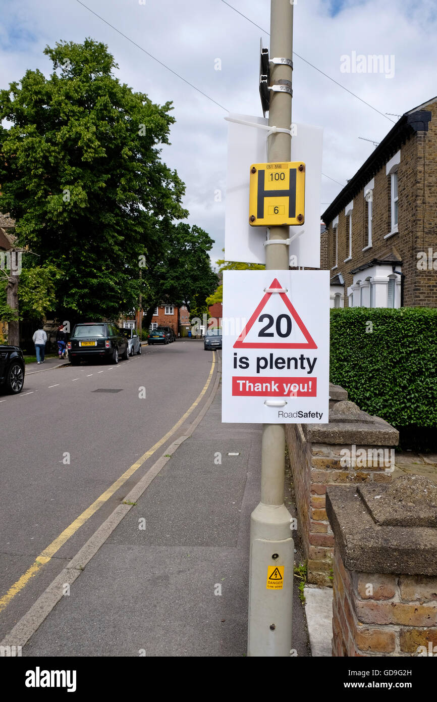 A speed advisory notice on a street pole in Brentwood Essex indicating 20 mph is plenty Stock Photo