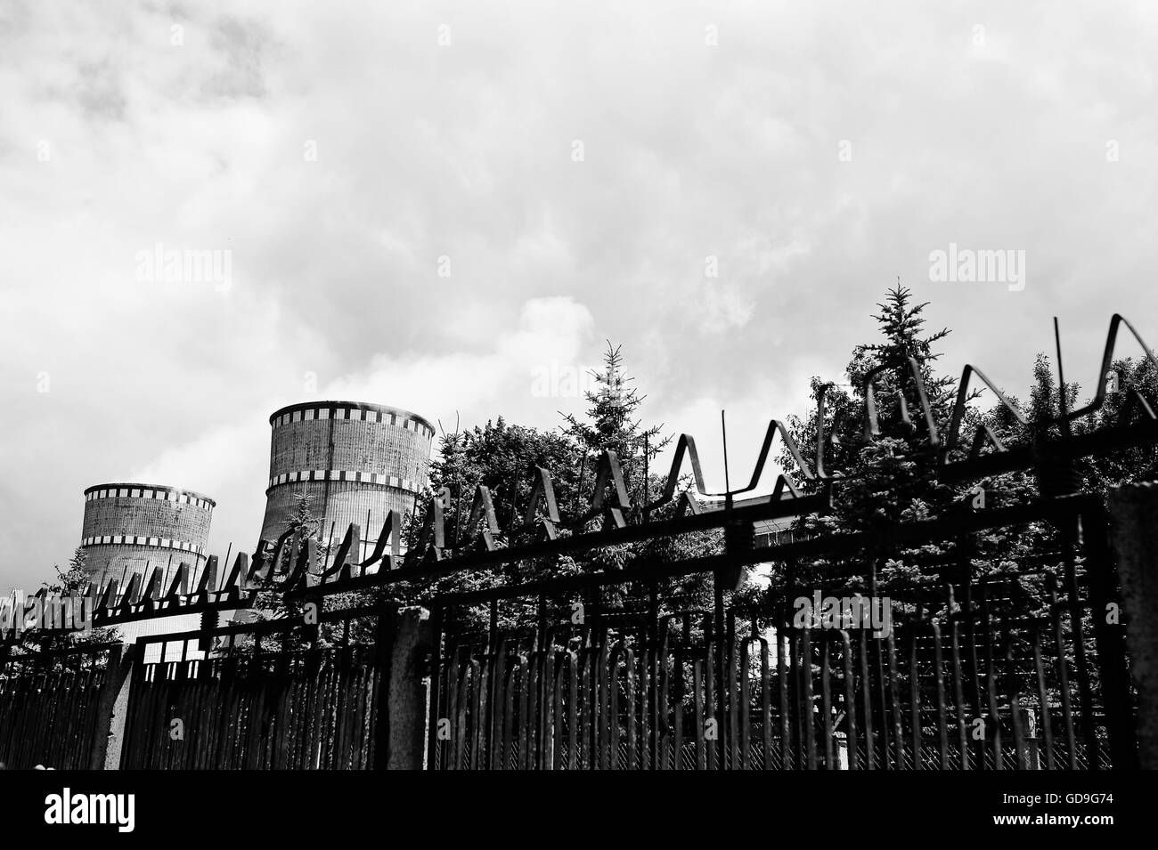 Nuclear power station. Tops of cooling towers of atomic power plant ...
