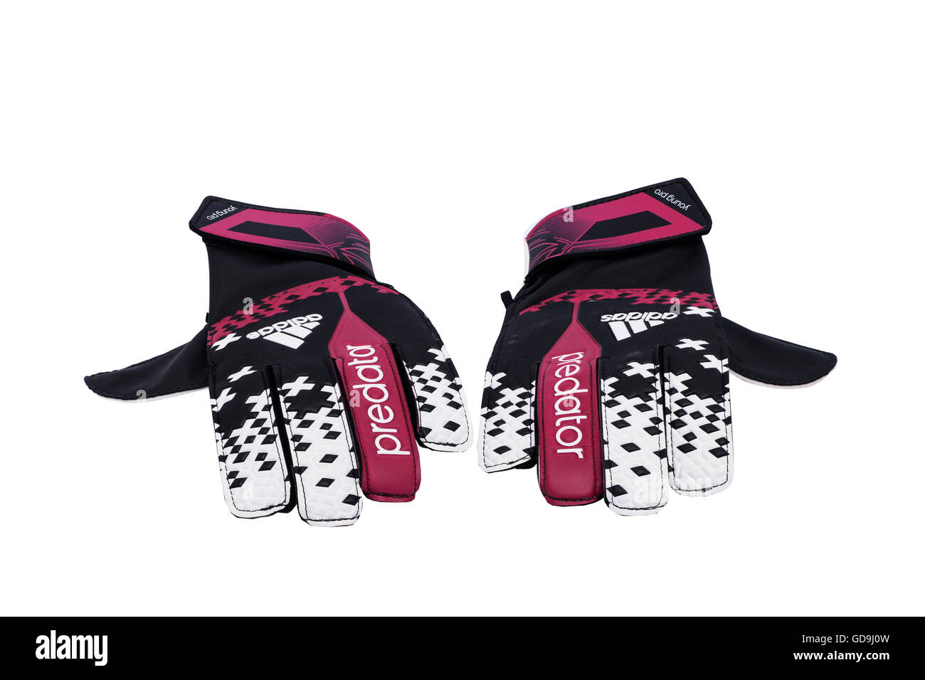 A pair of goalkeeper football gloves on a white background Stock Photo
