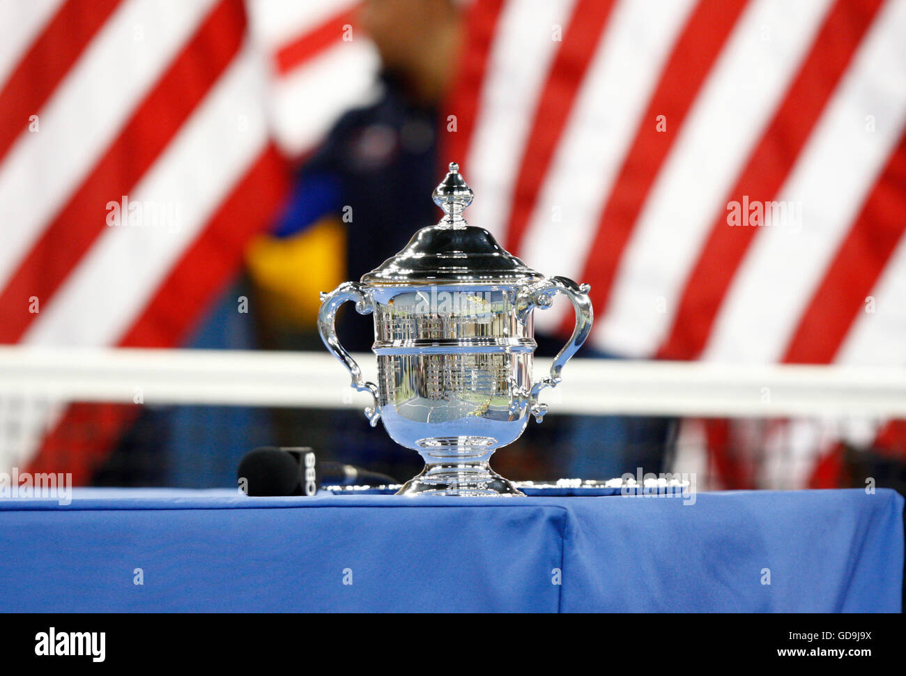 Women's finals, award ceremony, cup on a table in front of the U.S. flag, U.S. Open 2010, ITF Grand Slam Tennis Tournament, USTA Stock Photo