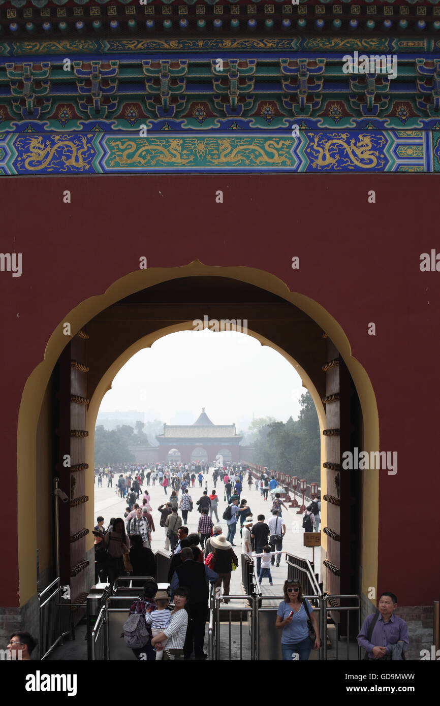 Lots of tourists going through the West Sky Gate which is west of the Temple of Heaven. The Temple of Heaven Park, Beijing, China. Stock Photo
