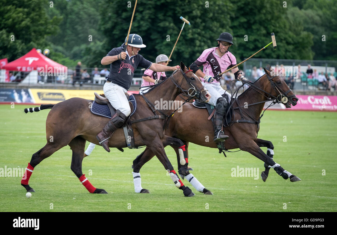 Polo action at the Dallas Burston polo grounds in Southam, Warwickshire, UK Stock Photo