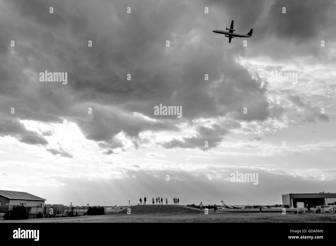 Montreal, Canada- July 3, 2016: Group of people making photos of planes at observation point near Montreal Airport Stock Photo