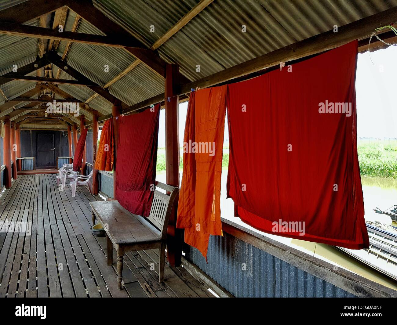 Monks robes hanging up to dry at a monastery in Inle Lake, Myanmar Stock Photo