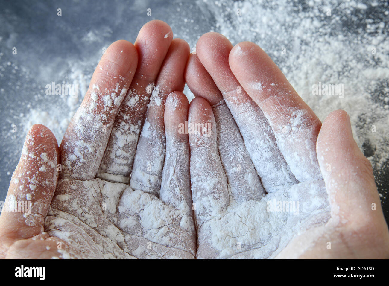 Talcum powder on two hands Stock Photo Alamy