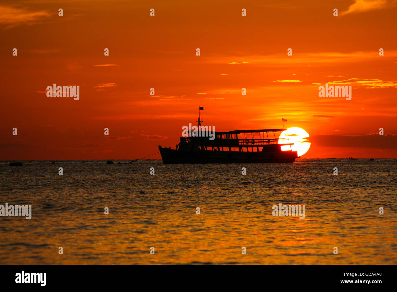 sunset on the beach with fishing boat in Pattaya, Thailand Stock Photo ...