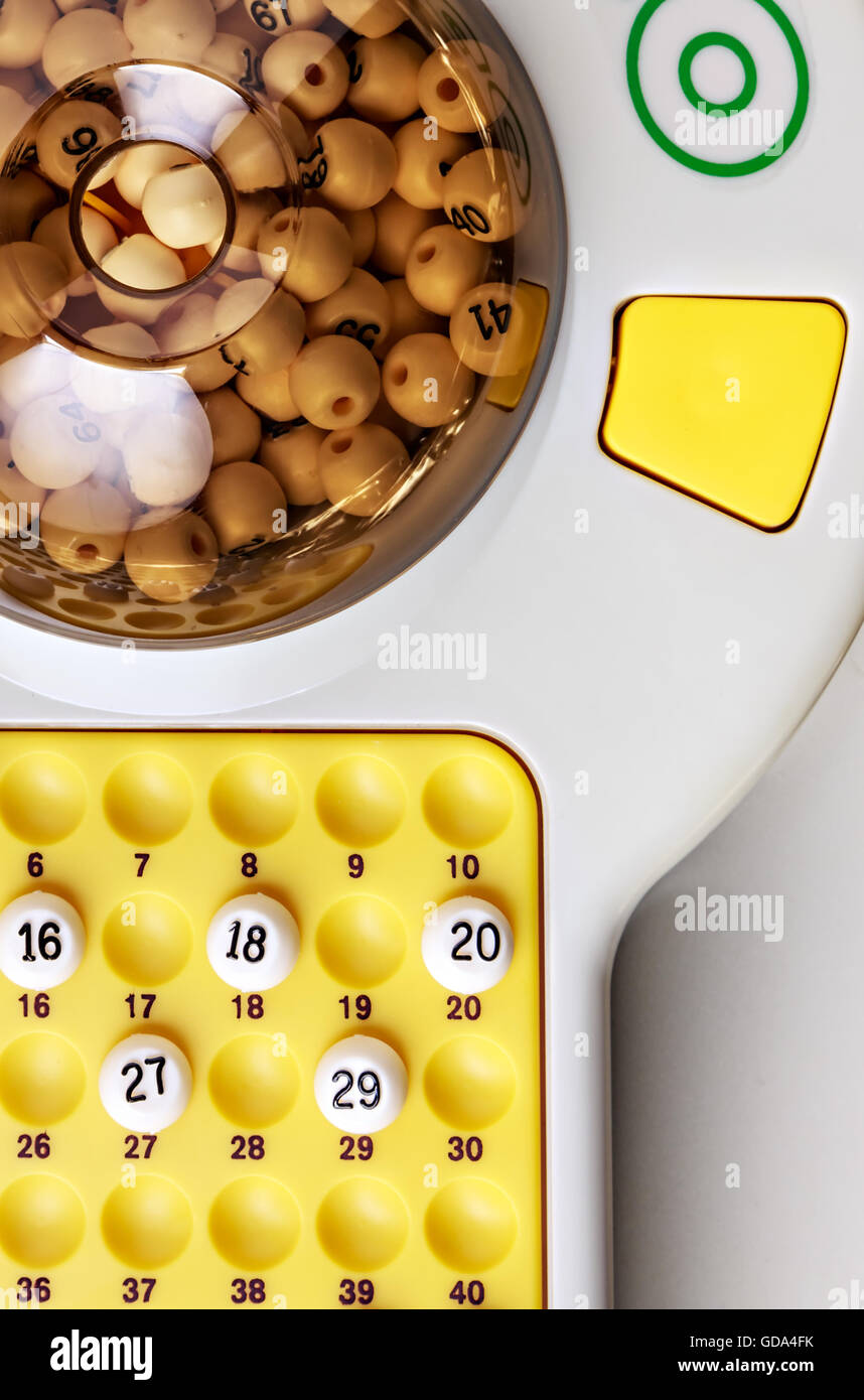 electronic bingo game with balls to play. Vertical image viewed from