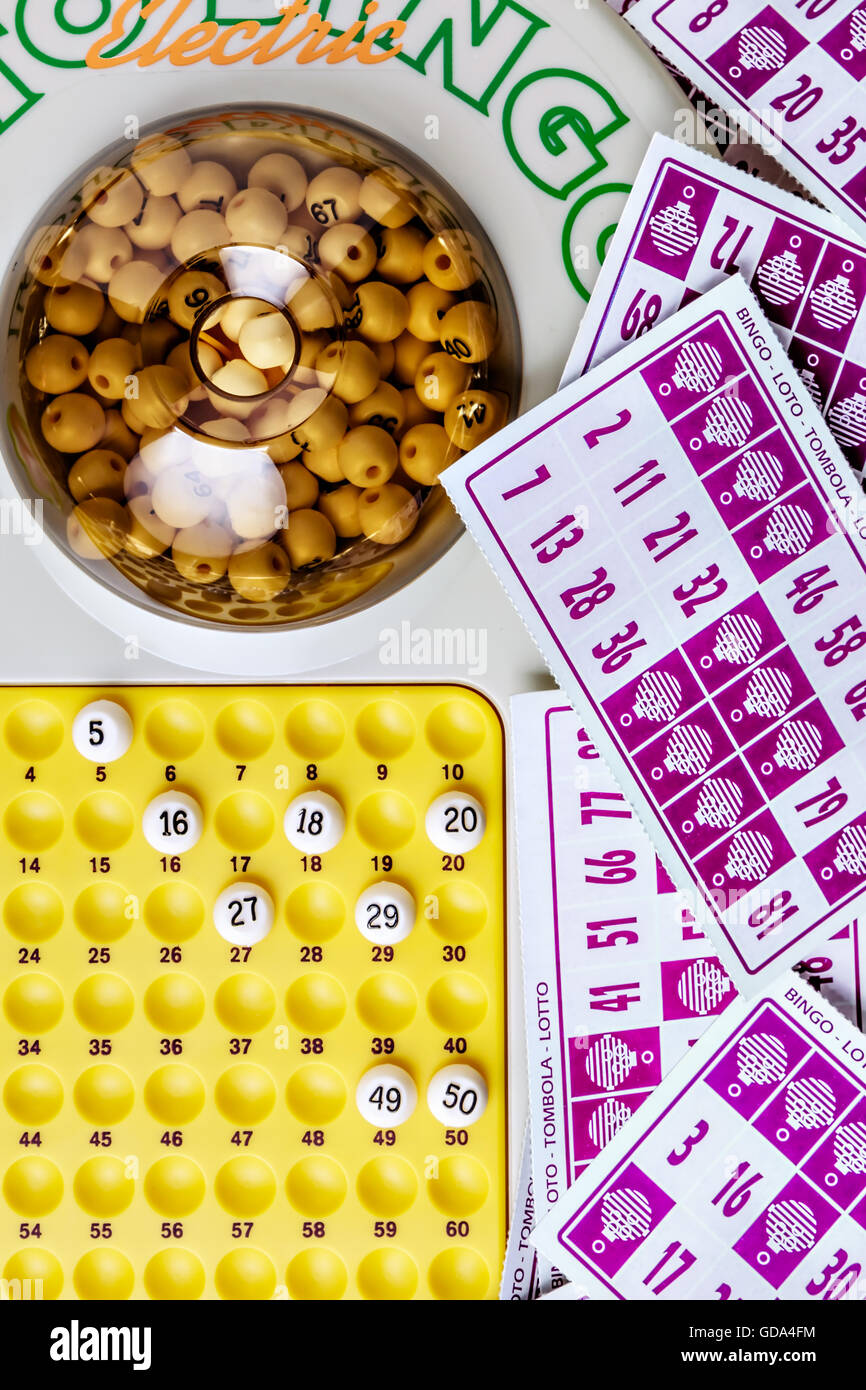 Electronic bingo game with cards to play. Vertical image viewed from