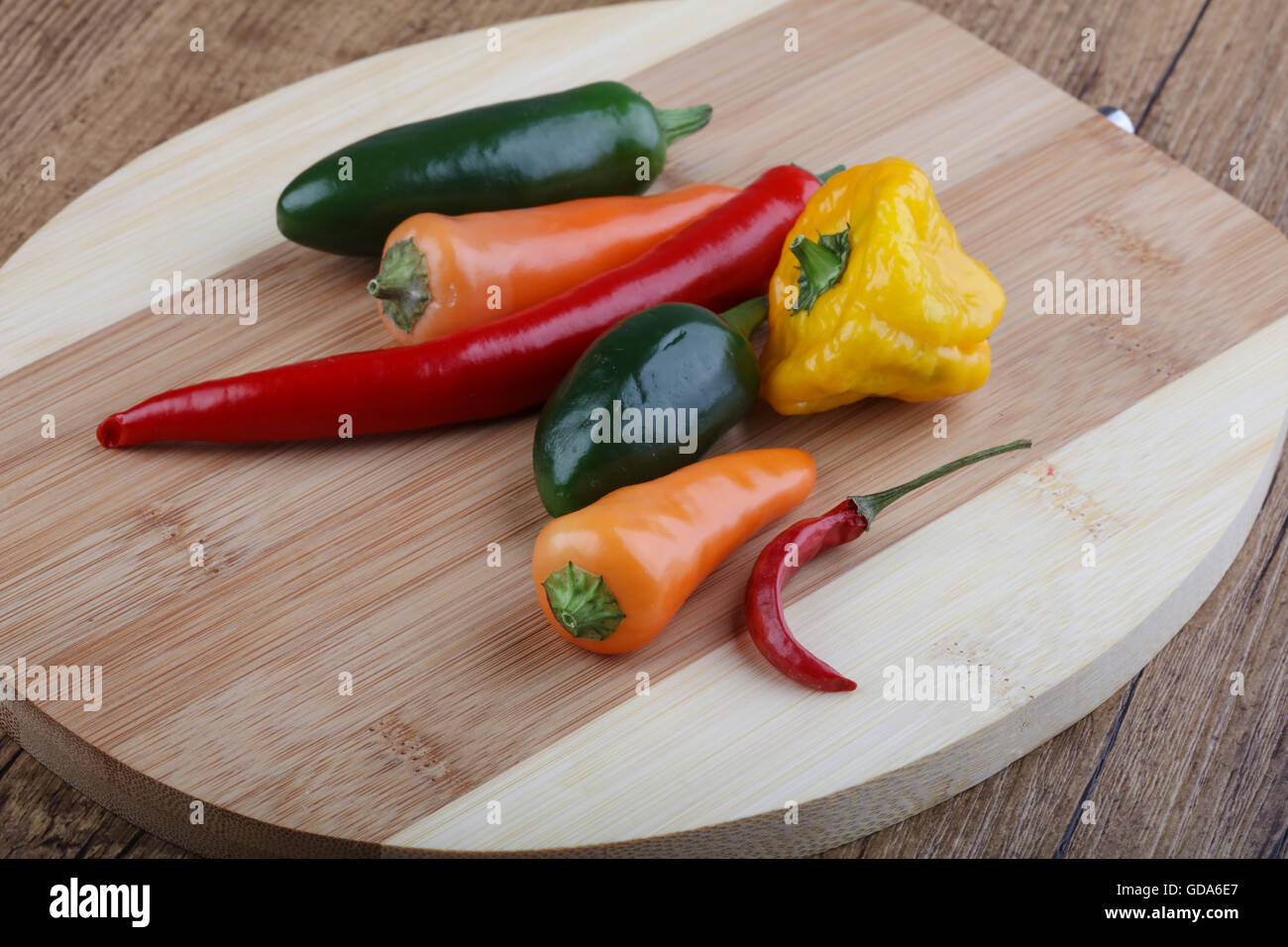 Pepper mix on the wood background Stock Photo