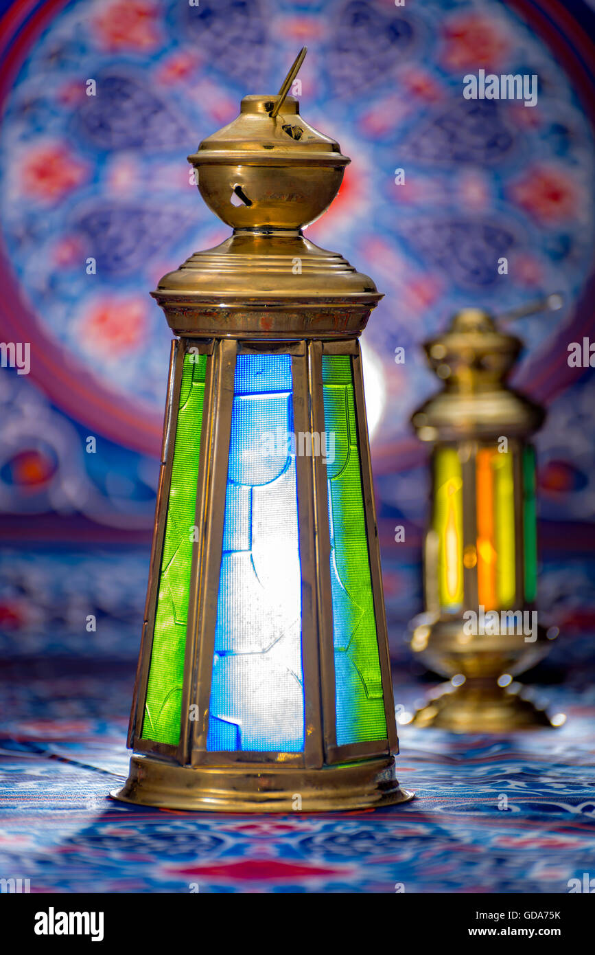 Ramadan Lanterns over Traditional Ramadan Fabric Stock Photo