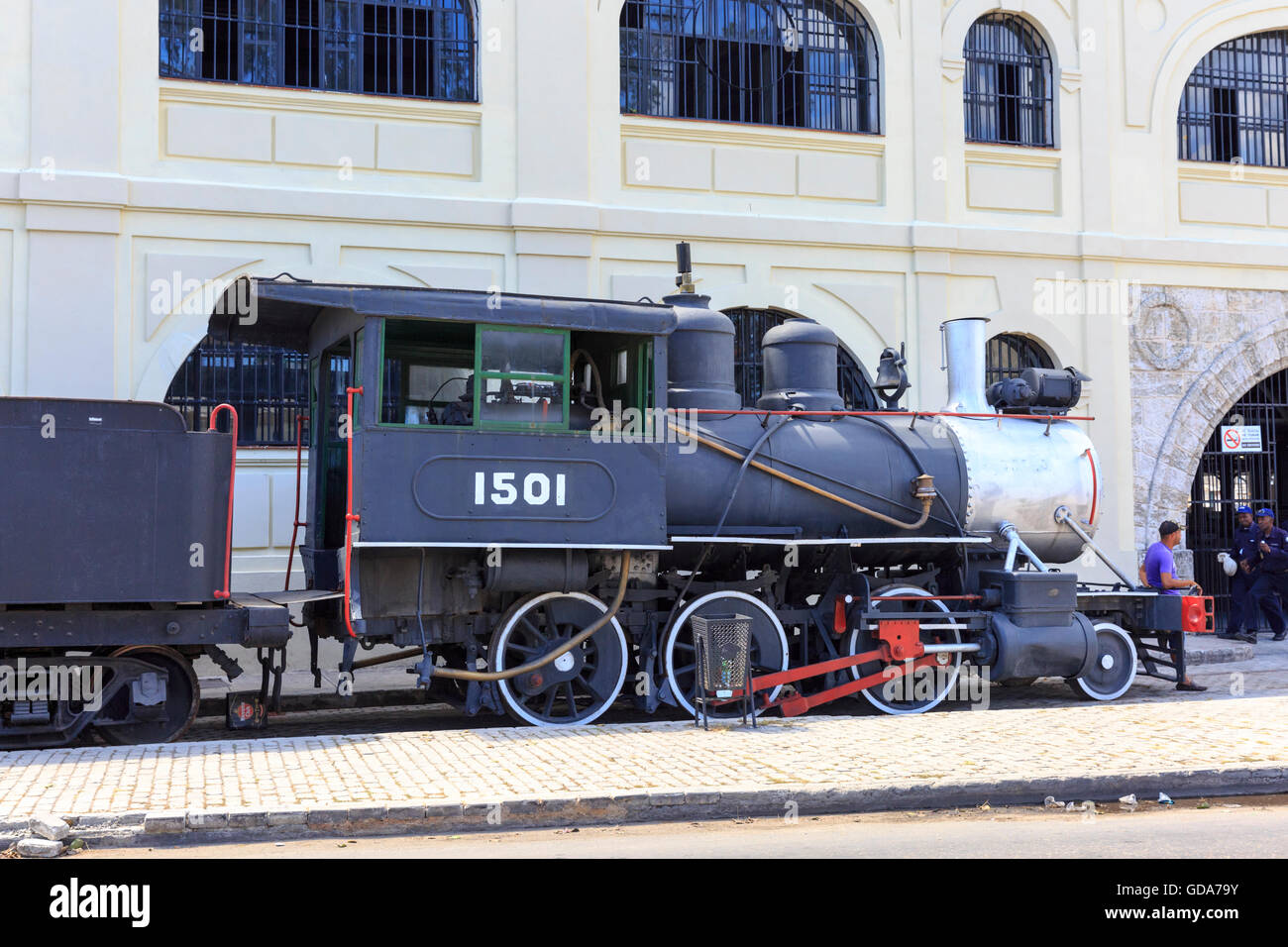 Restored Steam locomotive outside the old docks and Almacenes San José Artisan Market in Havana, Cuba Stock Photo