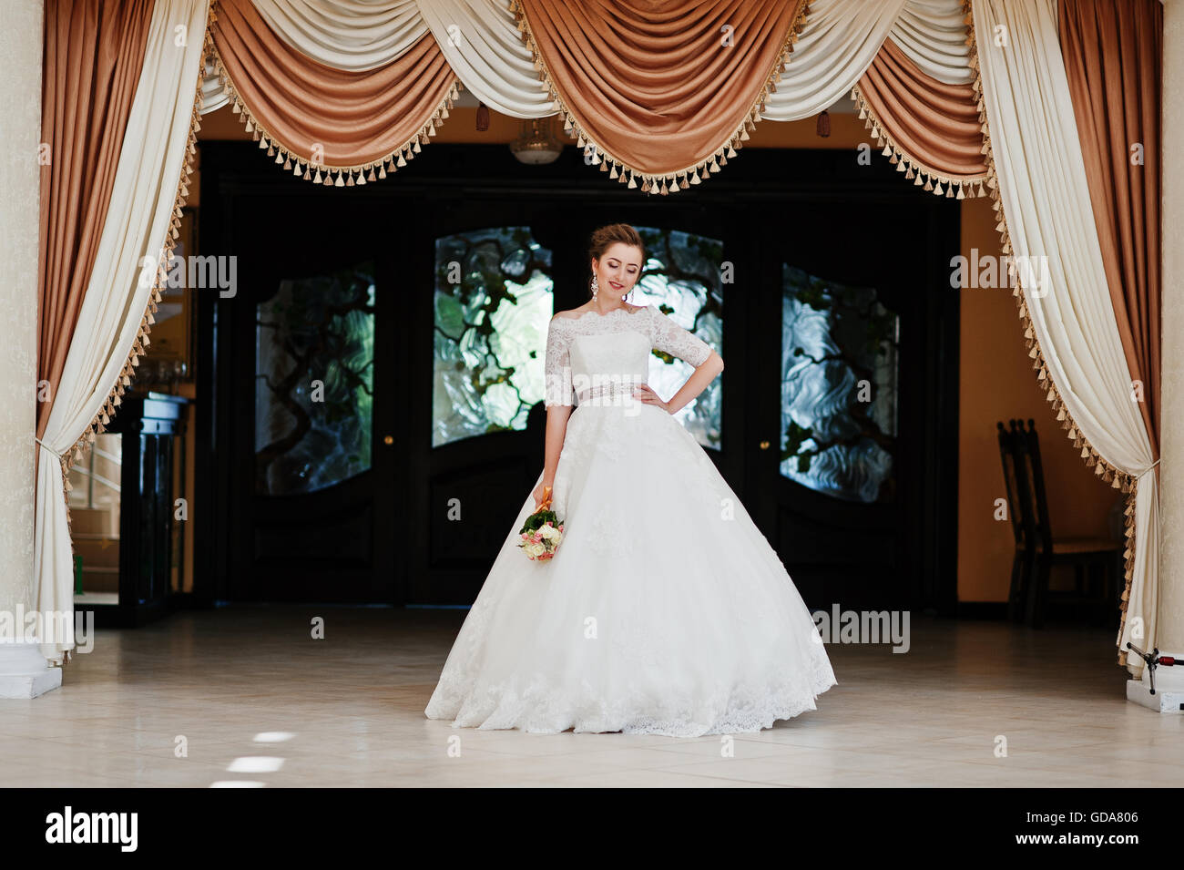 Portrait Of Beautiful Bride At Wedding Hall Background Curtains